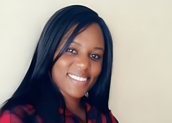 Portrait of Charity Chenai Chigwada, Zimbabwean principal engineer specialising in cybersecurity, innovation, and women in tech.