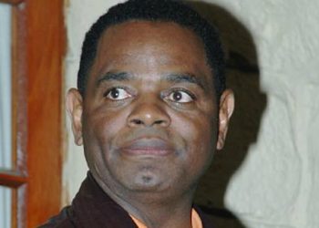 Portrait of Mutumwa Dziva Mawere, Zimbabwean businessman and former mining magnate.