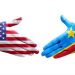 Illustration of hands painted with the flags of the United States and Democratic Republic of Congo reaching toward each other.
