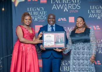 Dr Eng Edzai Kachirekwa receives Legacy Laureate Award at ENZ ceremony, standing center with framed certificate.