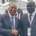 Dr Edzai Kachirekwa shakes hands with South Africa Electricity and Energy Minister Dr Kgosientsho Ramokgopa at an energy conference in Cape Town.
