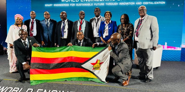 Zimbabwean engineers pose with the national flag during World Engineering Day 2026 celebrations in Jakarta, Indonesia.