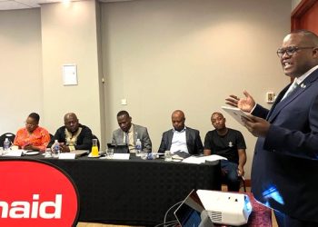 Committee Chairperson Caston Matewu addresses attendees during a breakfast meeting on accountability in state-linked mining enterprises.