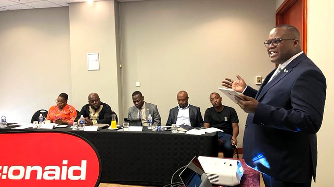 Committee Chairperson Caston Matewu addresses attendees during a breakfast meeting on accountability in state-linked mining enterprises.