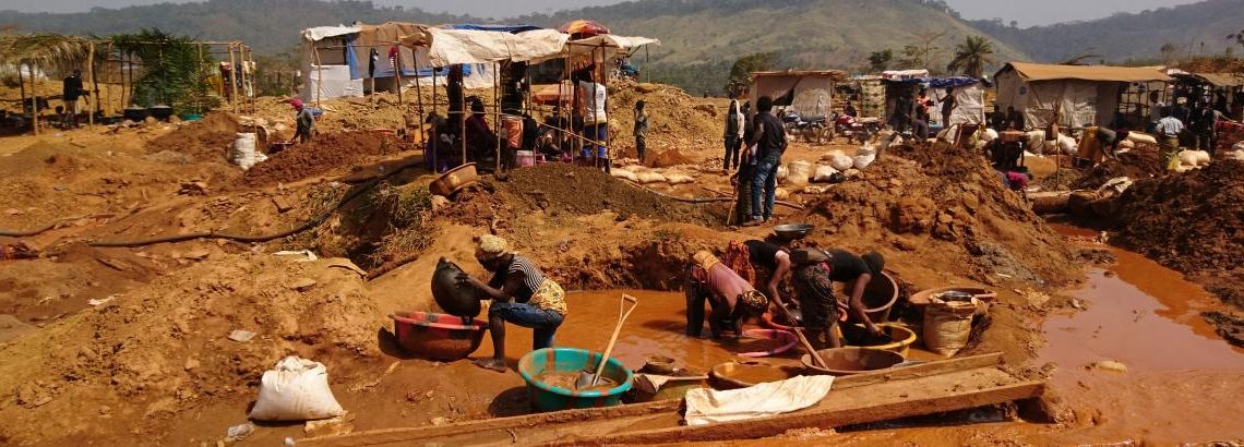Artisanal miners working at a small-scale mining site.