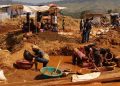 Artisanal miners working at a small-scale mining site.