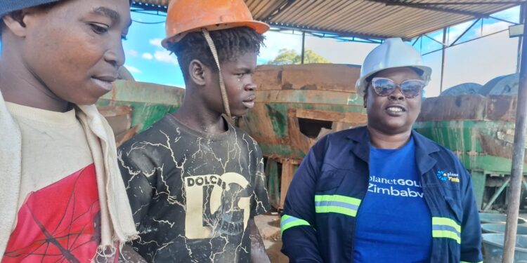 Artisanal miners with PlanetGOLD Zimbabwe Project Manager Nyaradzo Mutonhori at G‑Zone Mining and Milling Company, Chegutu.