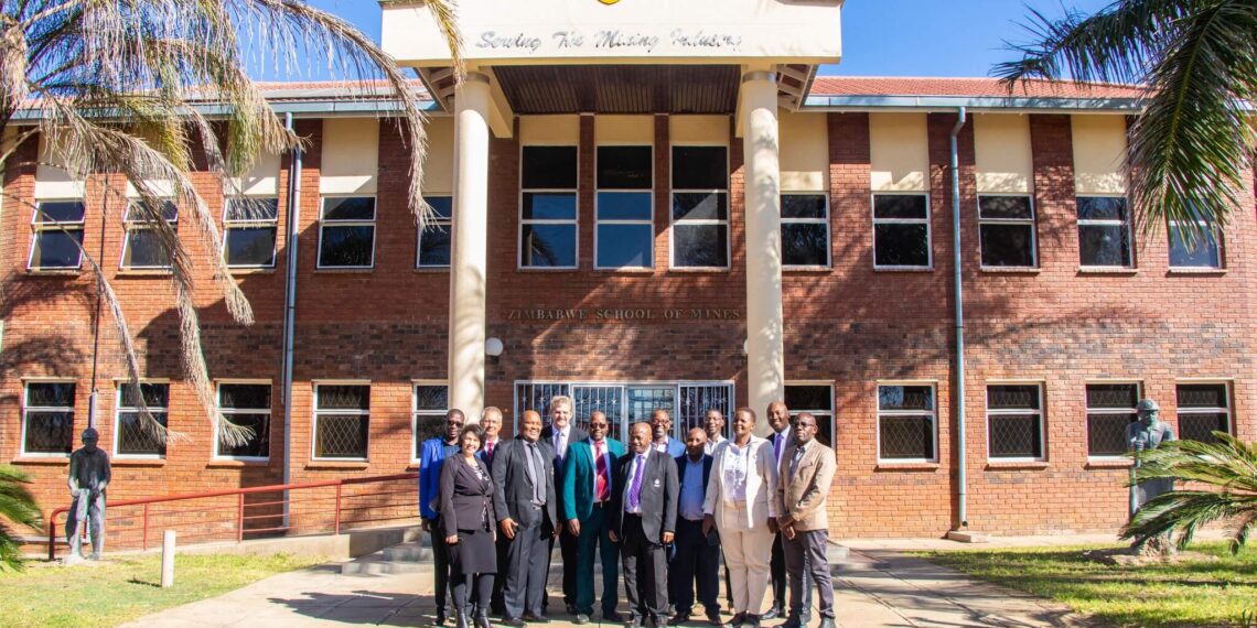 Zimbabwe School of Mines building in Bulawayo with people gathered outside.