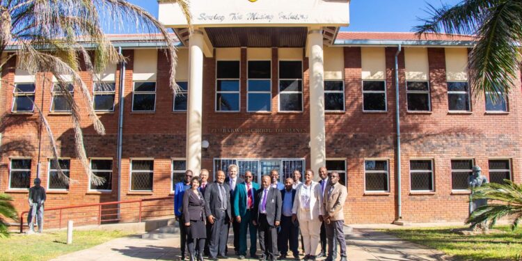 Zimbabwe School of Mines building in Bulawayo with people gathered outside.