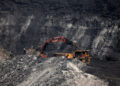 File photo of a loader loading coal onto a truck at Topa coal mine, Ramgarh district, Jharkhand, India