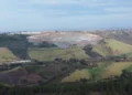 Aerial view of SA Lithium Mine in Magog, South Africa, bordered by farmland threatened by mining expansion