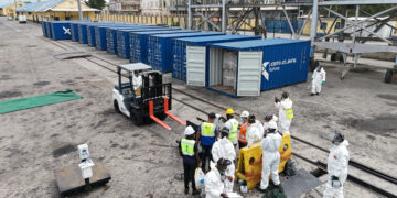 Bags of artisanal cobalt hydroxide arrive in the port of Lobito