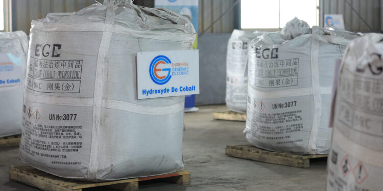 Bags of artisanal cobalt hydroxide stored in a warehouse in Kolwezi, DRC, awaiting transport