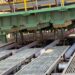 Freshly cast square steel billets move along rollers inside Dinson Iron and Steel Company's steel plant in Manhize, Zimbabwe.