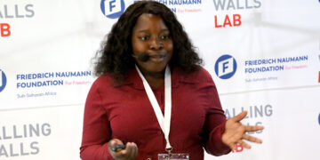 Melindah Kufeni presents her Smart Fatigue Detection Glasses prototype at Falling Walls Lab Zimbabwe 2026.