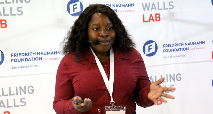 Melindah Kufeni presents her Smart Fatigue Detection Glasses prototype at Falling Walls Lab Zimbabwe 2026.