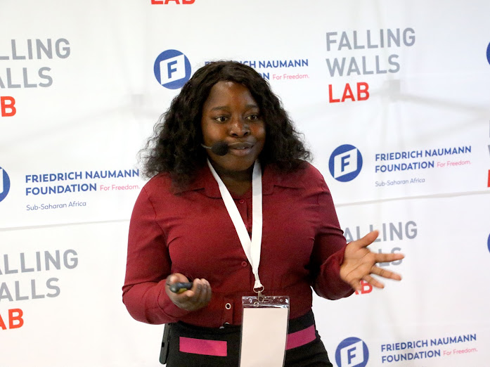 Melindah Kufeni presents her Smart Fatigue Detection Glasses prototype at Falling Walls Lab Zimbabwe 2026.