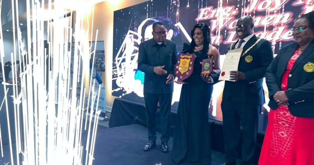 Engineer Charity Chenai Chigwada receives an award at the Zimbabwe Institution of Engineers Annual Dinner.