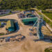 Aerial view of Caledonia Mining's Blanket Gold Mine in Zimbabwe. Title