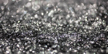 Annealed neodymium iron boron magnets in a barrel, prior to being crushed into powder