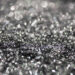 Annealed neodymium iron boron magnets in a barrel, prior to being crushed into powder