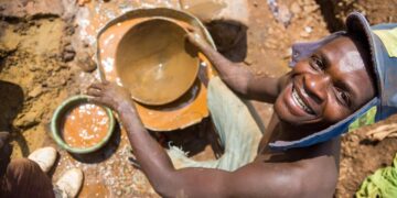 Artisanal gold miners work at a mine site in Makaha, Mudzi.