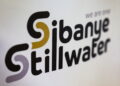 A logo of Sibanye Stillwater is seen at a mine in Marikana