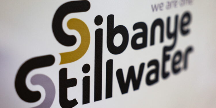A logo of Sibanye Stillwater is seen at a mine in Marikana