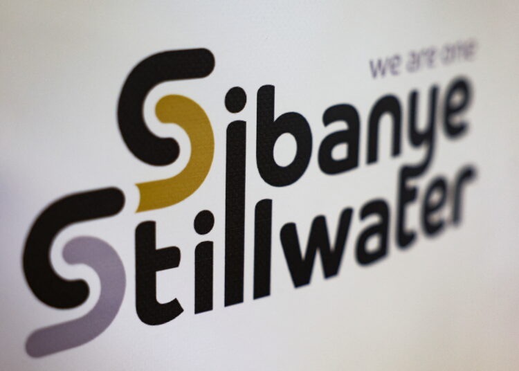 A logo of Sibanye Stillwater is seen at a mine in Marikana