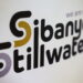 A logo of Sibanye Stillwater is seen at a mine in Marikana