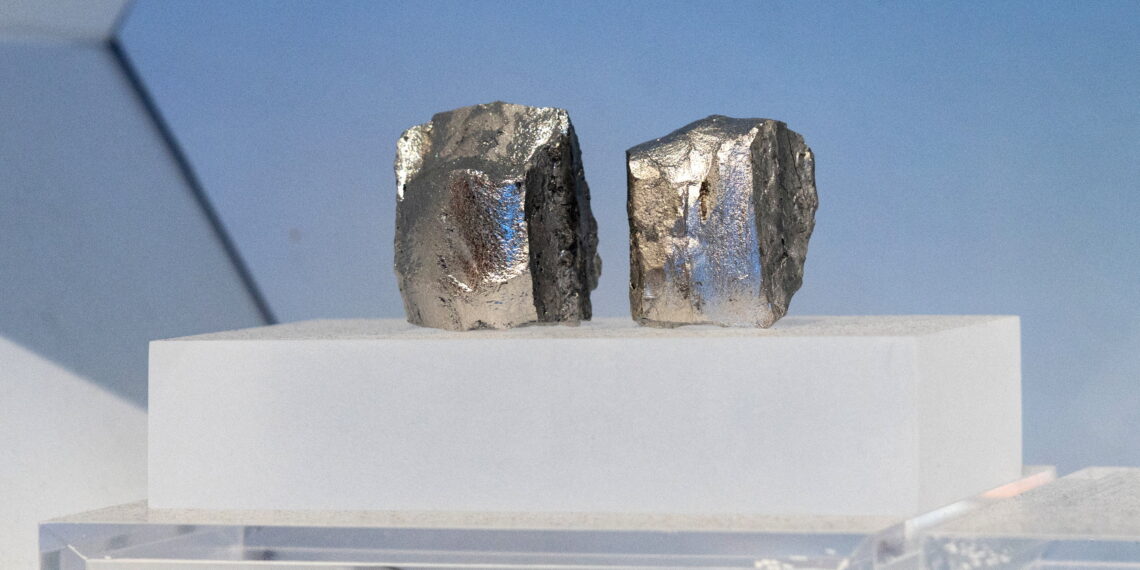 Hydrogen‑storage alloy ingots are displayed in the rare earth elements production section of the exhibition on China’s manufacturing achievements, in Beijing