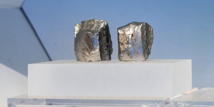 Hydrogen‑storage alloy ingots are displayed in the rare earth elements production section of the exhibition on China’s manufacturing achievements, in Beijing