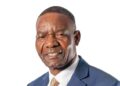 Alexander Mhembere, chief executive of Zimplats Holdings, in a blue suit and patterned tie
