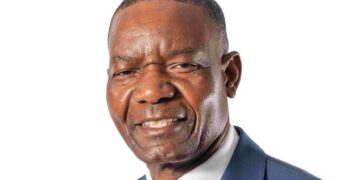 Alexander Mhembere, chief executive of Zimplats Holdings, in a blue suit and patterned tie