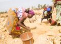 Artisanal women miners work at a small-scale mining site in Zimbabwe.