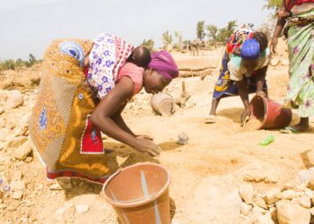 Artisanal women miners work at a small-scale mining site in Zimbabwe.