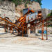 Aggregate screening conveyors and processing equipment at a Zhongji crushing and screening plant.