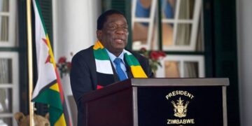 President Emmerson Mnangagwa speaking at a lectern marked "President, Zimbabwe"